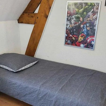 House With Garden And Barbecue In